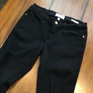 Frame black distressed skinny jeans